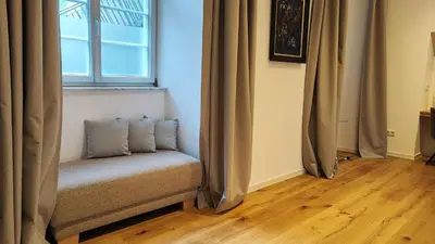 Ein Sitzbereich in der Unterkunft Moderner Luxus in barockem Gewand