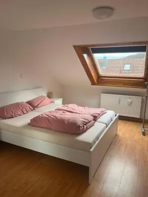 Ein Bett oder Betten in einem Zimmer der Unterkunft 2 Zimmerwohnung