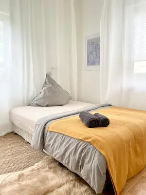 Ein Bett oder Betten in einem Zimmer der Unterkunft Modernes Designer Loft mit Flair in Hochheim & Tiefgarage