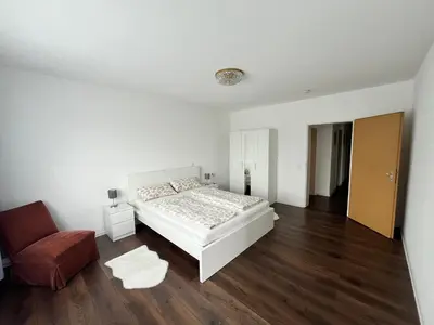 Ein Bett oder Betten in einem Zimmer der Unterkunft Panorama-Perle I 3-Zimmer-Wohnung mit Aussicht