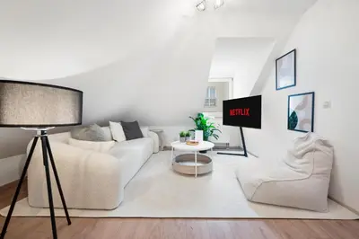 TV/Unterhaltungsangebot in der Unterkunft Malu Rooms - im Stadtzentrum, Klima, SmartTV, Netflix, 24h Checkin