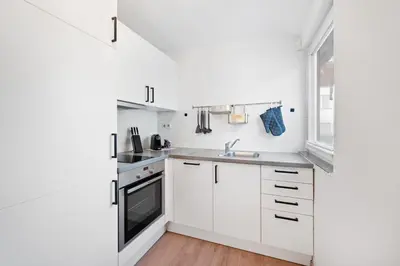 Küche/Küchenzeile in der Unterkunft Malu Rooms - im Stadtzentrum, Klima, SmartTV, Netflix, 24h Checkin