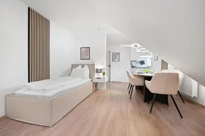 Ein Bett oder Betten in einem Zimmer der Unterkunft Malu Rooms - im Stadtzentrum, Klima, SmartTV, Netflix, 24h Checkin
