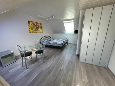 Ein Bett oder Betten in einem Zimmer der Unterkunft Weingut und Gästehaus Fritz