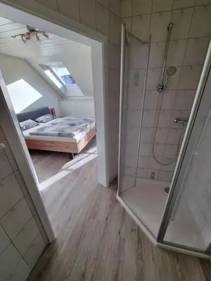Ein Bett oder Betten in einem Zimmer der Unterkunft Weingut und Gästehaus Fritz