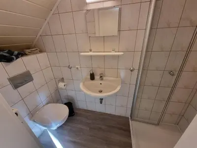 Ein Badezimmer in der Unterkunft Weingut und Gästehaus Fritz