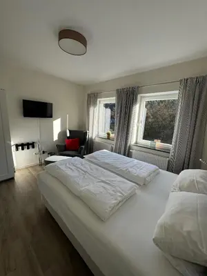 Ein Bett oder Betten in einem Zimmer der Unterkunft Ferienwohnung Sommerlinde