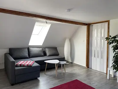 Ein Sitzbereich in der Unterkunft gemütliche Ferienwohnung an der Enz