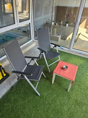 Ein Patio oder anderer Außenbereich in der Unterkunft Luxus-Wohnung mit IndoorPool