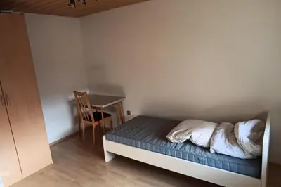 Ein Bett oder Betten in einem Zimmer der Unterkunft NEU! FeWo Skalstr. Philippsburg