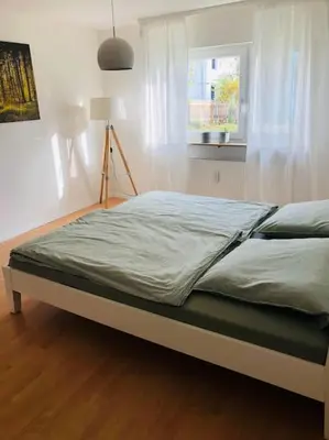 Ein Bett oder Betten in einem Zimmer der Unterkunft Wohnung in Oberriexingen