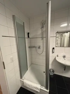 Ein Badezimmer in der Unterkunft Pension Gergert am Neckar