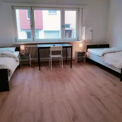 Ein Bett oder Betten in einem Zimmer der Unterkunft MZK Maier Günstig Zentral Einfach 75qm