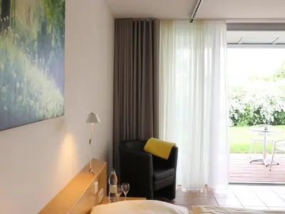 Ein Sitzbereich in der Unterkunft Seminarhotel in der Manfred-Sauer-Stiftung
