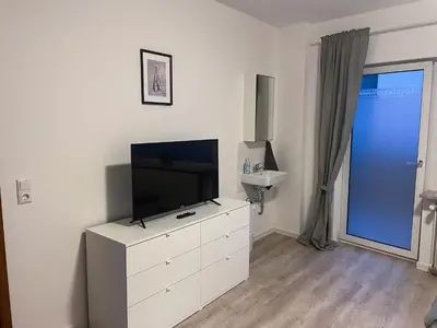 TV/Unterhaltungsangebot in der Unterkunft bookandstay24 Die-burg 4 Zimmerwohnung mit Küche und Balkon bei Darmstadt, Frankfurt, RheinMain Gebiet