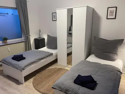 Ein Bett oder Betten in einem Zimmer der Unterkunft bookandstay24 Die-burg 4 Zimmerwohnung mit Küche und Balkon bei Darmstadt, Frankfurt, RheinMain Gebiet