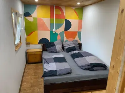Ein Bett oder Betten in einem Zimmer der Unterkunft Cozy Tiny House mit WLAN & Sauna