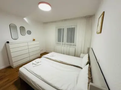 Ein Bett oder Betten in einem Zimmer der Unterkunft Luxus Reihenmittelhaus