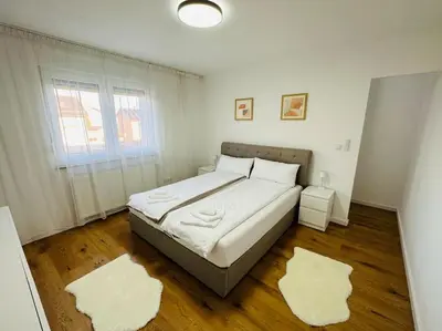Ein Bett oder Betten in einem Zimmer der Unterkunft Luxus Reihenmittelhaus