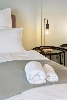 Ein Bett oder Betten in einem Zimmer der Unterkunft Mozartshomes#3 2,5 Rooms 6 Beds in Löchgau