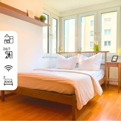 Ein Bett oder Betten in einem Zimmer der Unterkunft ZEN Apartment - Garage - Smart TV - Kitchen