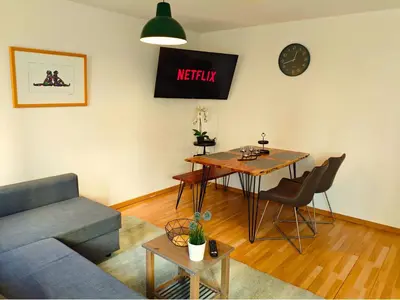 Ein Sitzbereich in der Unterkunft ZEN Apartment - Garage - Smart TV - Kitchen