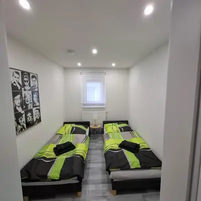 Ein Bett oder Betten in einem Zimmer der Unterkunft GRooms