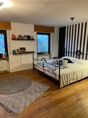 Ein Bett oder Betten in einem Zimmer der Unterkunft TinyStory - das Appartement mit Hotelgefühl in Obernburg