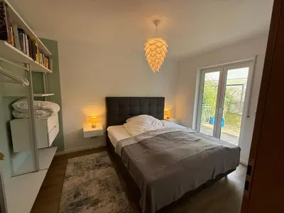Ein Bett oder Betten in einem Zimmer der Unterkunft Gartenapartment 1