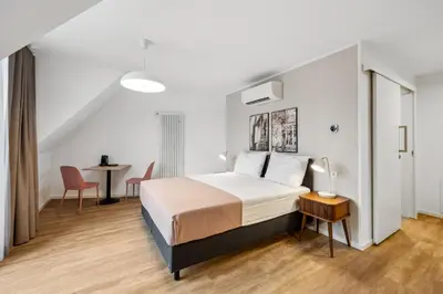 Ein Bett oder Betten in einem Zimmer der Unterkunft Limehome Karlsruhe Sophienstr