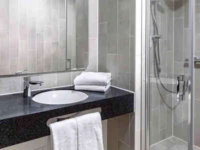 Ein Badezimmer in der Unterkunft B&B HOTEL Bruchsal-Karlsdorf