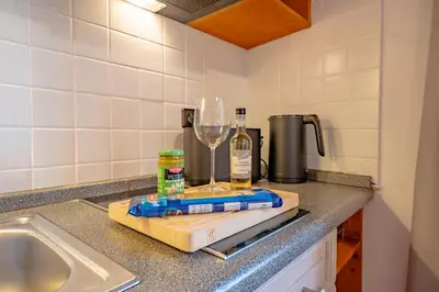 Küche/Küchenzeile in der Unterkunft SCHLOSSBERG RESIDENCES - Design-Apartments im Herzen der Pfalz