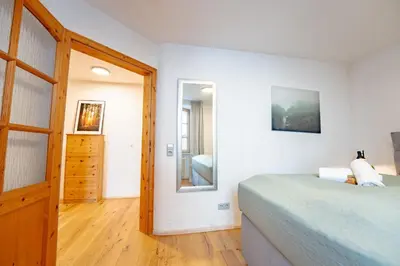 Ein Bett oder Betten in einem Zimmer der Unterkunft SCHLOSSBERG RESIDENCES - Design-Apartments im Herzen der Pfalz