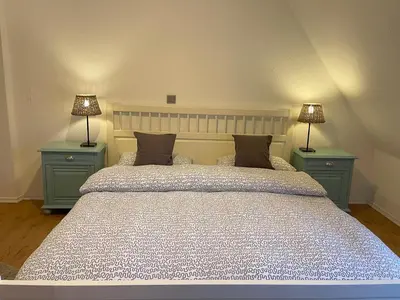 Ein Bett oder Betten in einem Zimmer der Unterkunft Ferienhaus an der KIostermauer