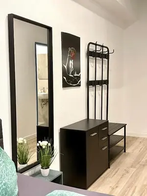 Ein Bett oder Betten in einem Zimmer der Unterkunft Goldstadt Cozy Smart Suite - City Apartament Schlössle
