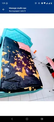 Ein Bett oder Betten in einem Zimmer der Unterkunft massage Sauna jakuzzi