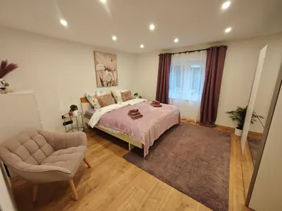 Ein Bett oder Betten in einem Zimmer der Unterkunft New 3 Zimmer Wohnung