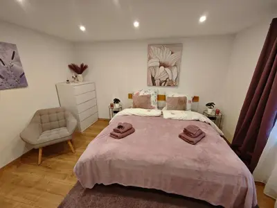 Ein Bett oder Betten in einem Zimmer der Unterkunft New 3 Zimmer Wohnung