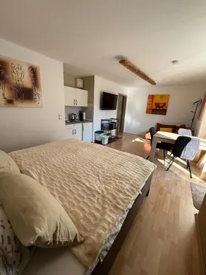 Ein Bett oder Betten in einem Zimmer der Unterkunft Wohnung mit Küche Balkon Parkplatz in der Nähe von Heidelberg