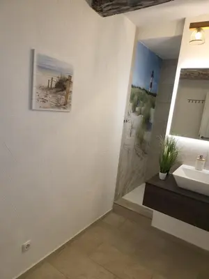 Ein Badezimmer in der Unterkunft Unterkunft Kostera DG