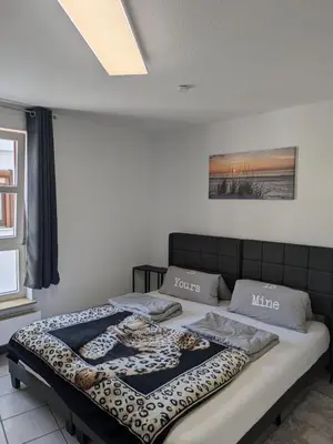 Ein Bett oder Betten in einem Zimmer der Unterkunft Große helle Wohnung nähe Audi und Lidl IT
