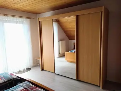 Ein Bett oder Betten in einem Zimmer der Unterkunft Ferien im Winzerhaus