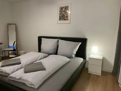 Ein Bett oder Betten in einem Zimmer der Unterkunft Süße Marie Durlach 12