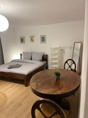 Ein Bett oder Betten in einem Zimmer der Unterkunft Süße Marie Durlach 13
