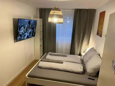 Ein Bett oder Betten in einem Zimmer der Unterkunft Süße Marie Durlach 14