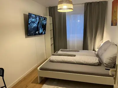 Ein Bett oder Betten in einem Zimmer der Unterkunft Süße Marie Durlach 14