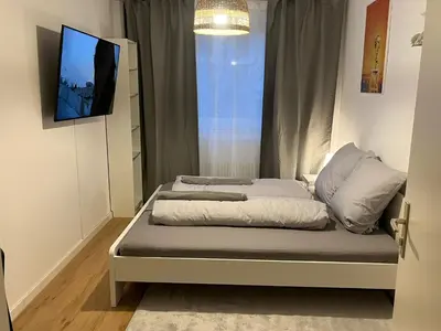 Ein Bett oder Betten in einem Zimmer der Unterkunft Süße Marie Durlach 14