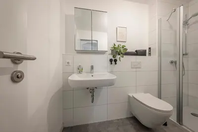 Ein Badezimmer in der Unterkunft Loftdesign 7 Personen Boxspring Frankenthal Ludwigshafen BASF