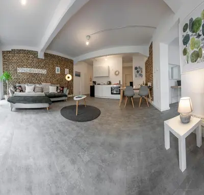 Ein Sitzbereich in der Unterkunft Loftdesign 7 Personen Boxspring Frankenthal Ludwigshafen BASF