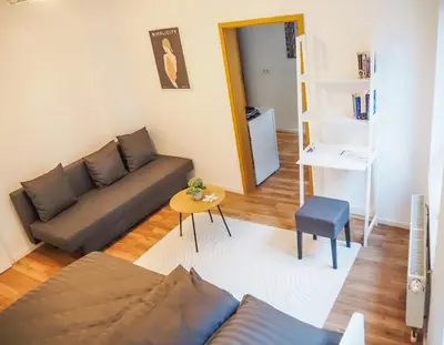 Ein Sitzbereich in der Unterkunft Charming old town apartment - Central in Neustadt